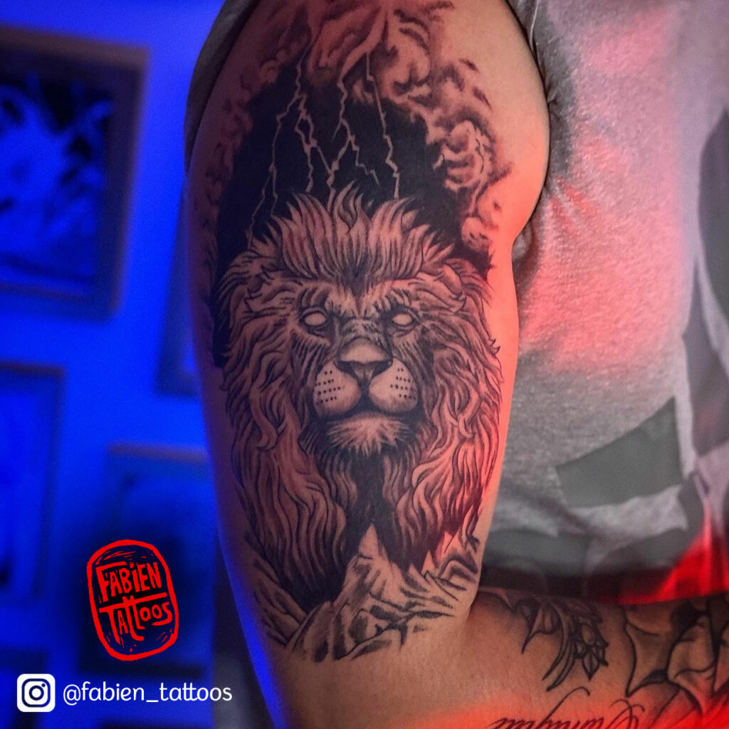 Tatouage lion tatoueur semi réaliste strasbourg